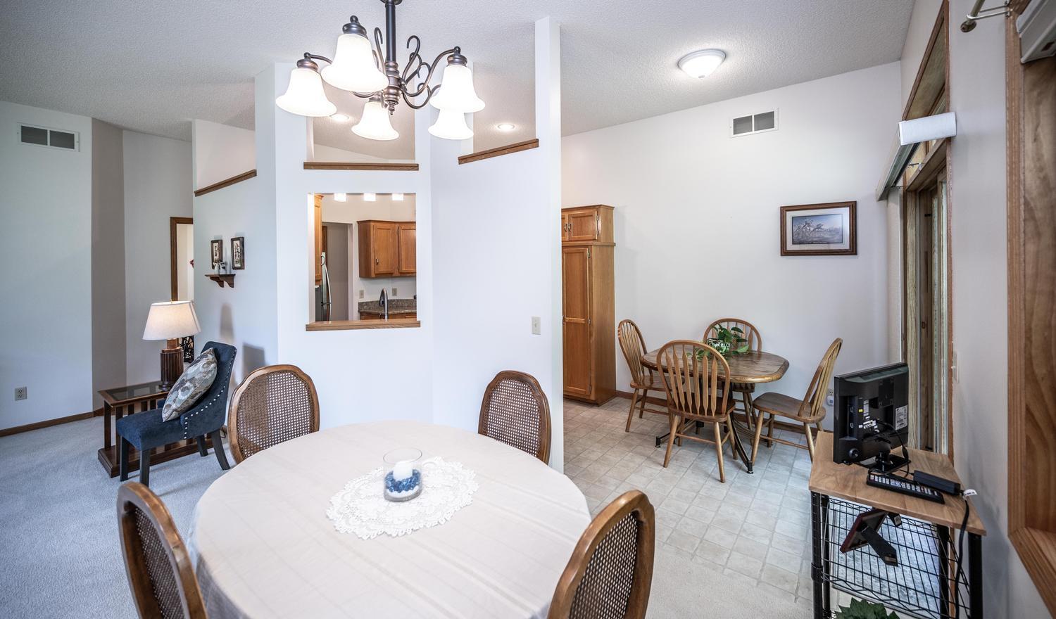 The formal dining area leads into an informal area and the kitchen