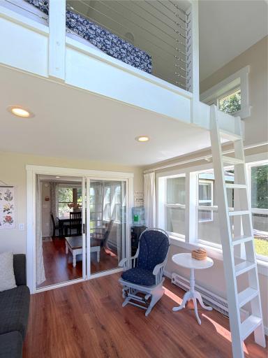 Whether you're watching the sunrise, reading a book, or gathering with friends, this bright and airy lakeside porch delivers spectacular views and a true Up North atmosphere.
