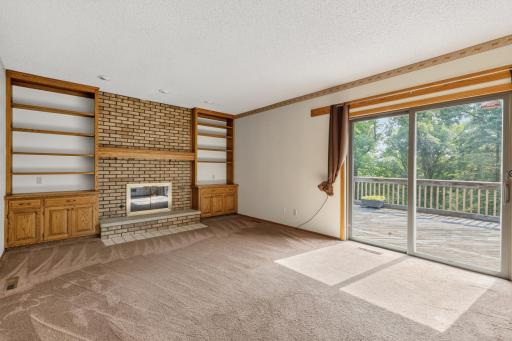 Living Room w/ patio door access to the deck and property.