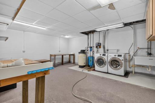 Laundry Room with Washer/Dryer & Utility sink + Workshop
