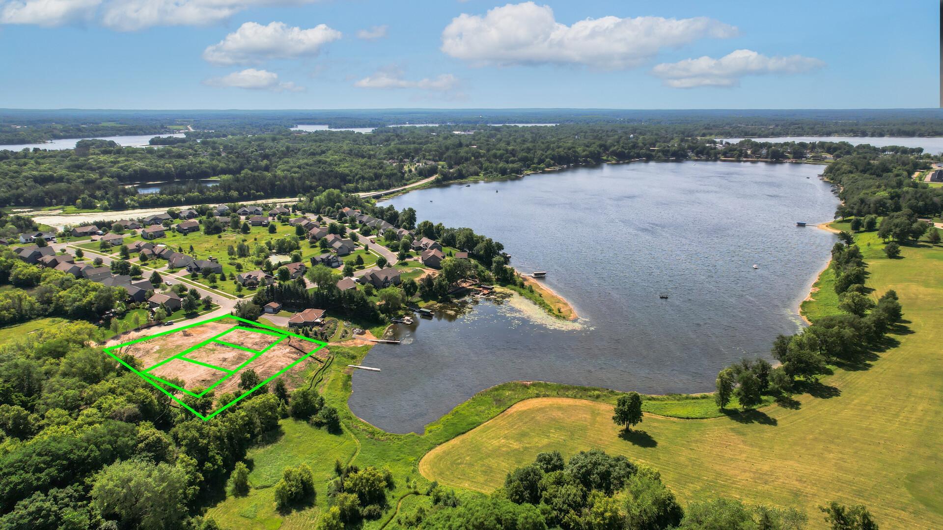2nd AI generated view showing the locations of the lots and the north end of the lake. Full lake access to 5 lakes in the Chisago Chain of Lakes! The majority of the land will be long to the HOA, no lake taxes!