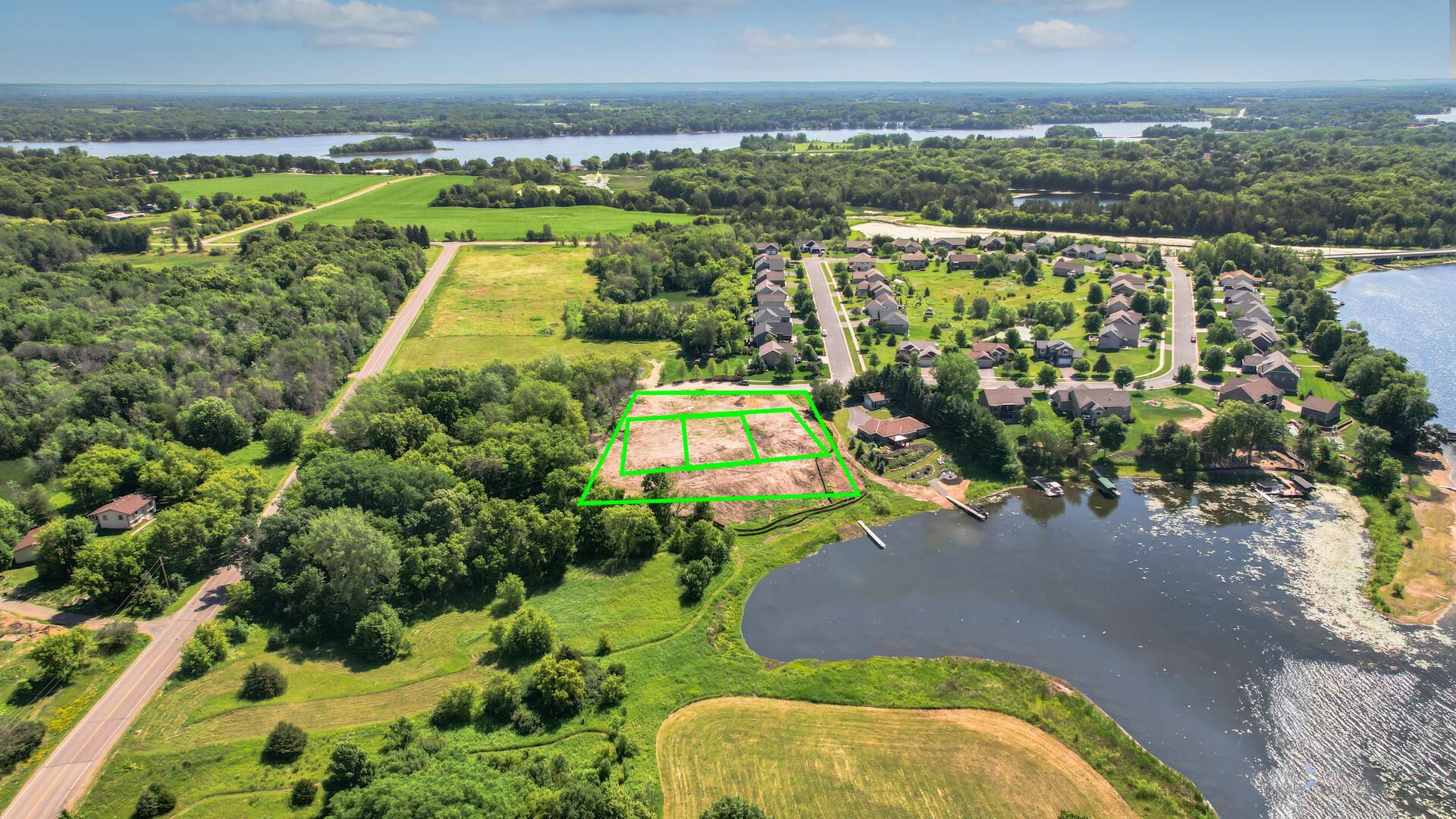Welcome to Albrecht Lake Lots! Lot A on RIGHT, Lot B is the middle, Lot C on LEFT . Rough outline where the lots will be located. AI generated to show the lot outlines as well as removing the current lake weeds. Seller will be removing.