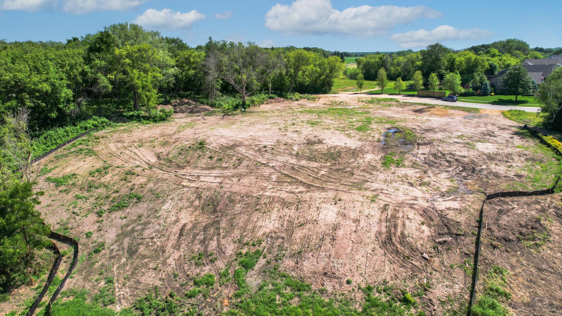 The lot was cleared of all trees and brush, new trees will be put as part of the landscaping plan for the lots.