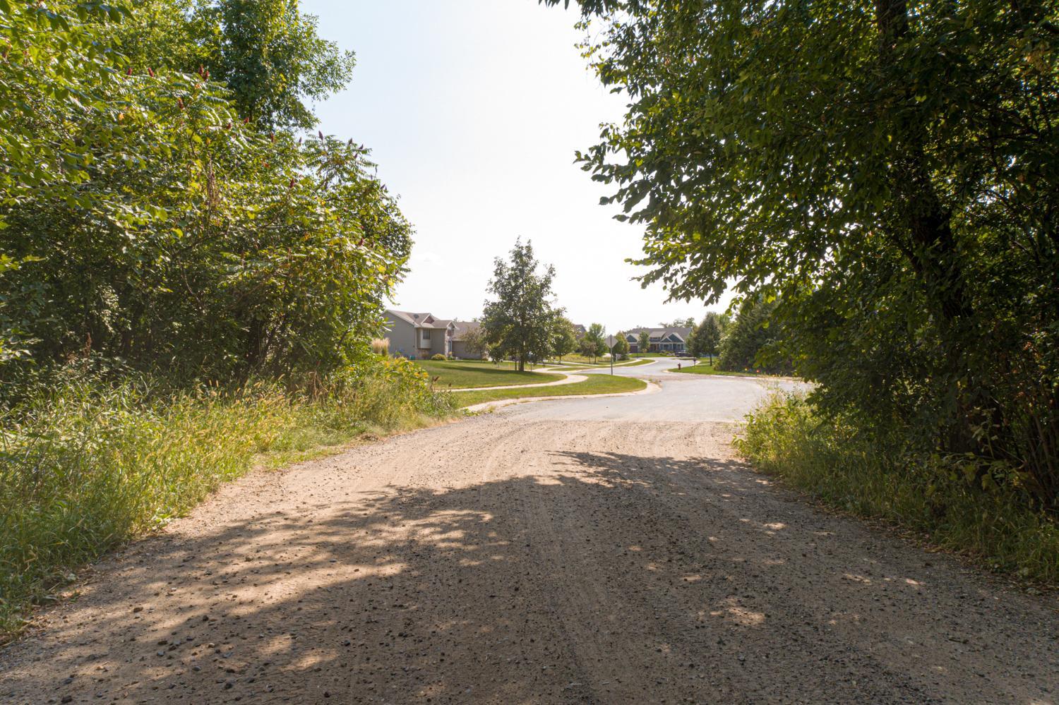 There are paved roads leading to these lots through the adjoining neighborhood.