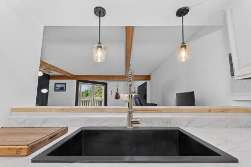 05 Kitchen pass through window to dining area.jpg