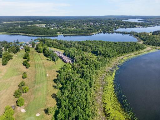 27 Aerial View of Building 3, Hill Lake, and The Hill Golf Course at Quadna.jpg