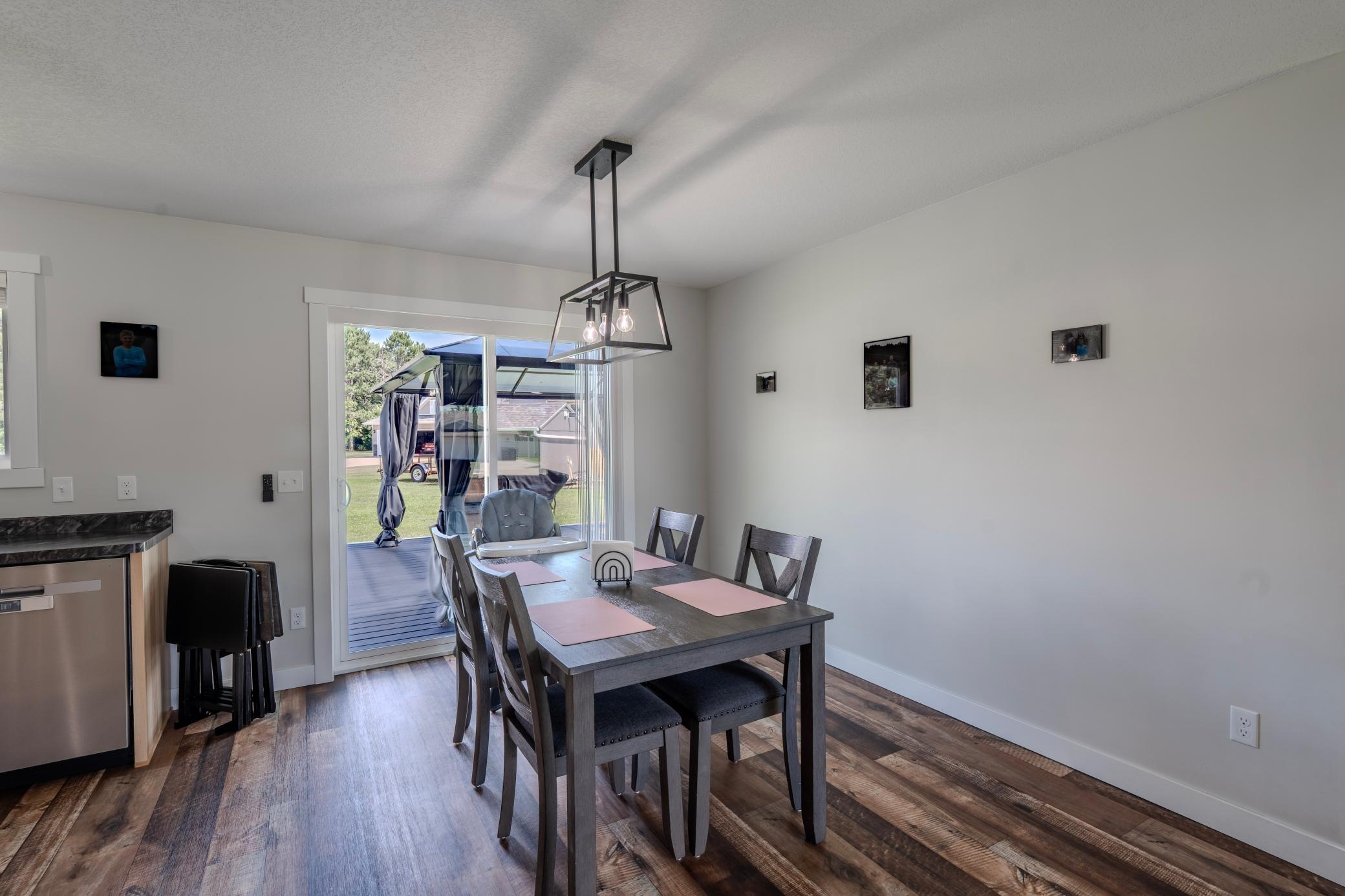 Dining room with patio door to deck
