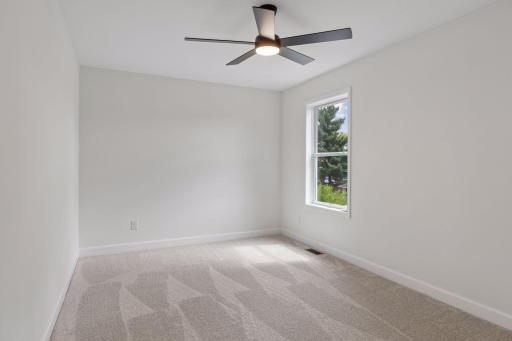 Upper level bedroom 4 from door with ceiling fan