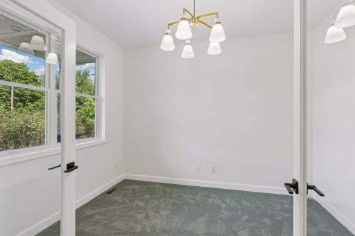 Office on main level and has view of front yard and street