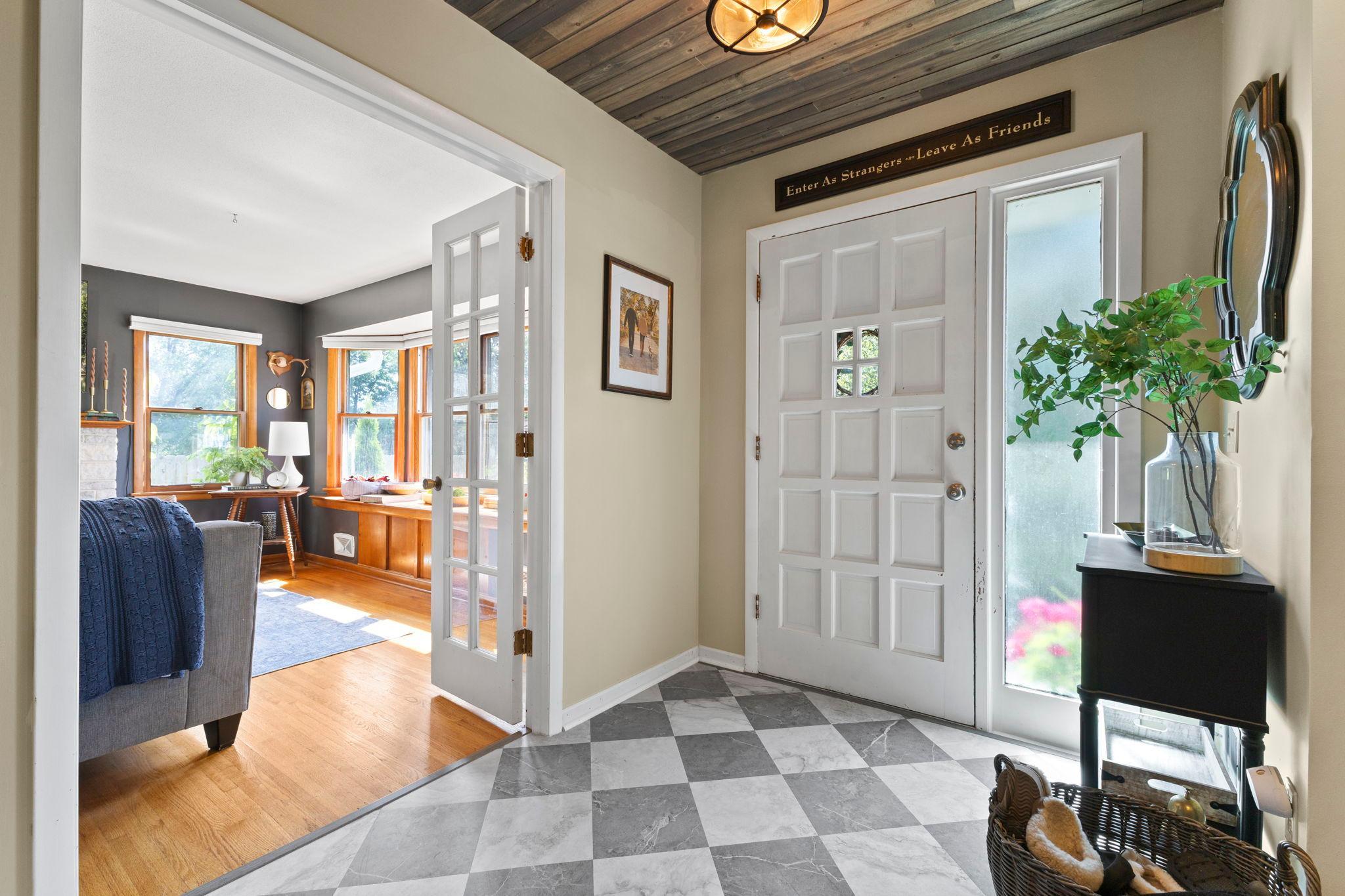A welcoming entryway provides an inviting first impression. Gorgeous updates from floor to ceiling!