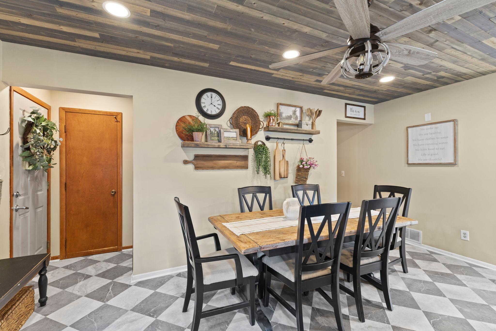 The dining room flows seamlessly into the kitchen for easy entertaining.