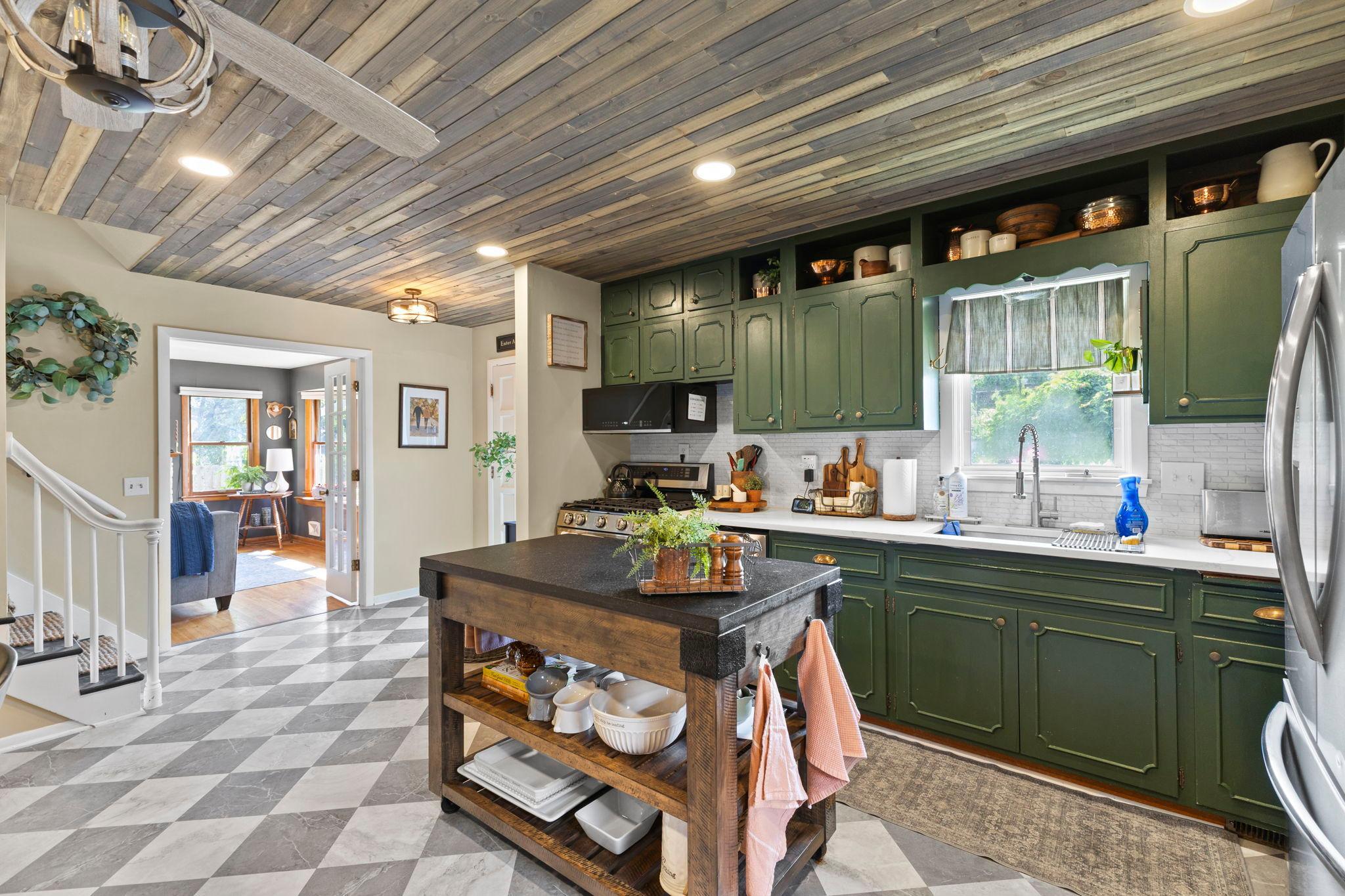 Beautiful countertops and thoughtful updates make this kitchen as beautiful as it is practical.