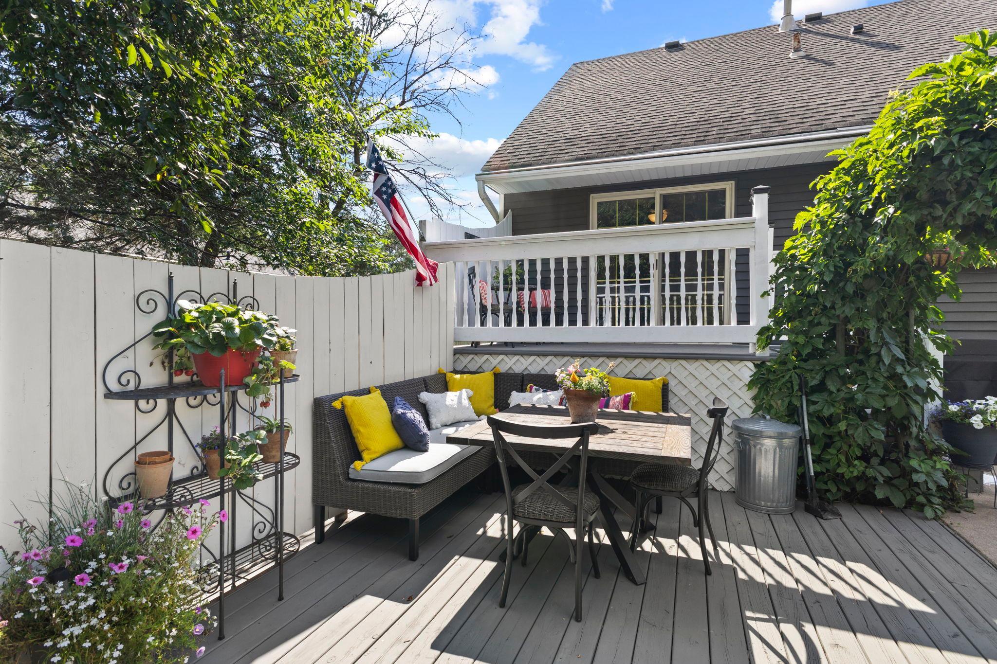 A cozy outdoor seating area creates the perfect spot for morning coffee.