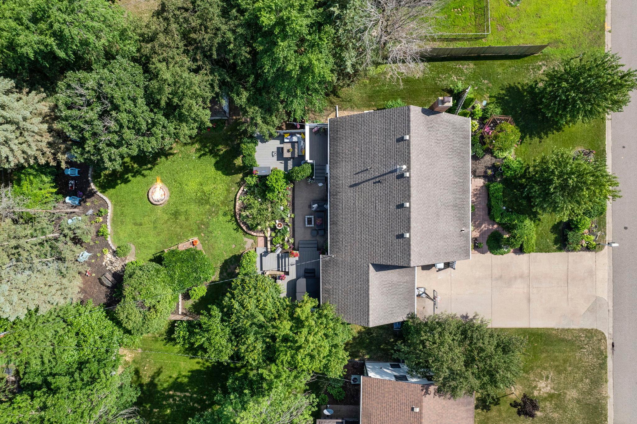The expansive backyard offers space to play, garden, or simply relax.