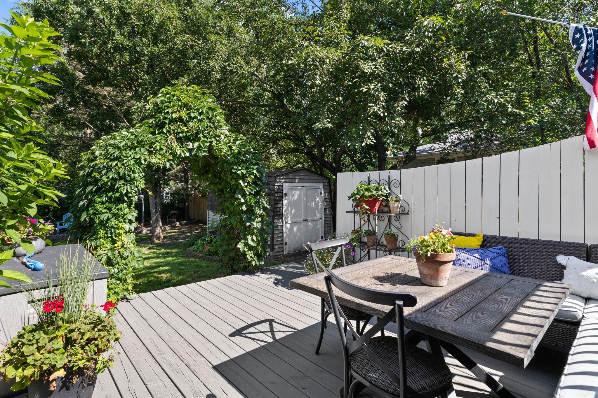 The spacious deck is ideal for grilling, dining, and entertaining outdoors.
