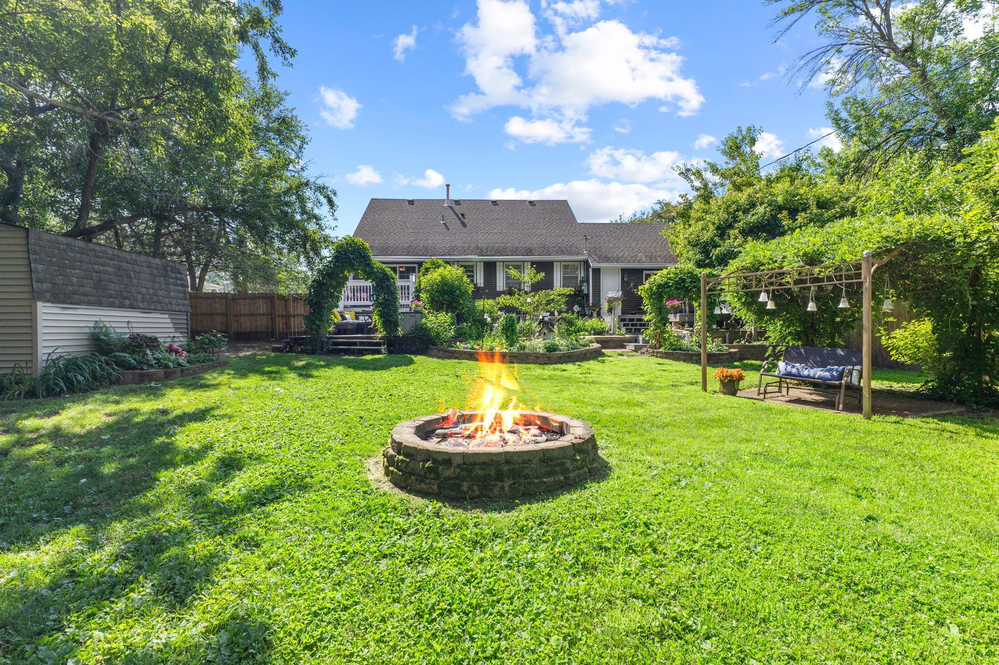 Enjoy your own private backyard oasis surrounded by mature trees.
