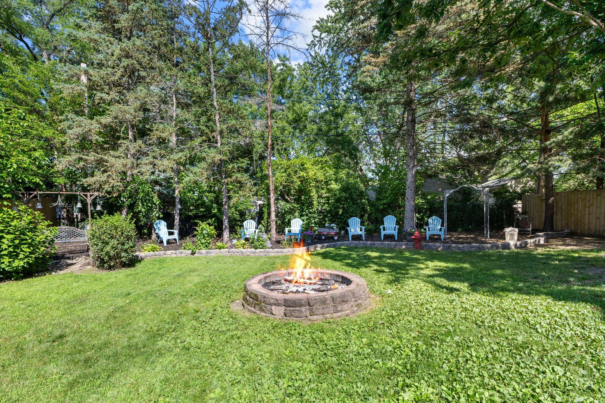 Gather around the backyard fire pit and enjoy peaceful evenings under the stars.