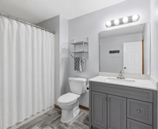 The updated lower-level full bathroom features a stylish vanity, contemporary finishes, and a tub/shower combinationâproviding added comfort and convenience for guests or extended stays.