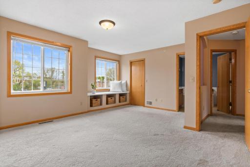 Bedroom 1 with bench seat, walk-in closet and bathroom