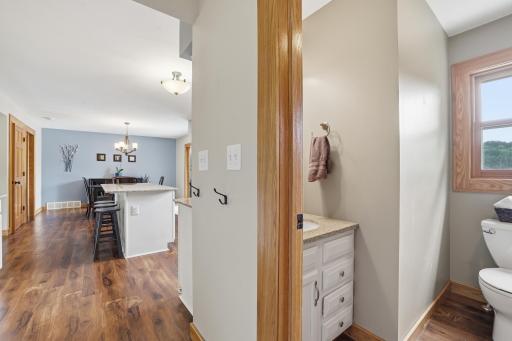 Main floor 1/2 bath right off the kitchen & garage