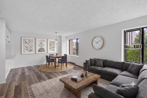 Open concept living dining room (virtually staged)