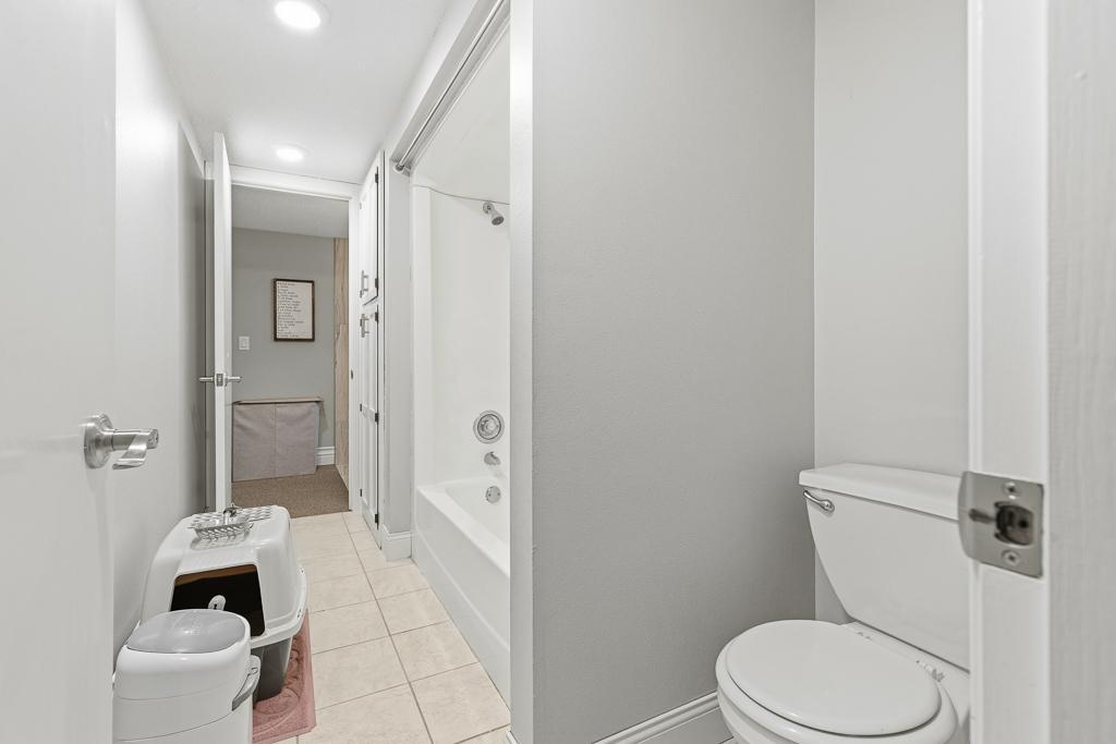 Walk-through full bathroom conveniently tucked between the two bedrooms!