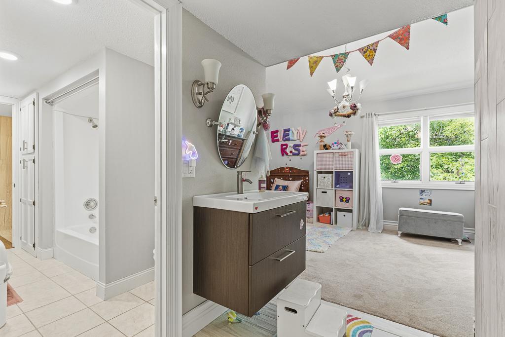 2 2nd story bedrooms both feature access to a walk-through full bathroom, and each have their own sink! How great is this for families with kiddos!