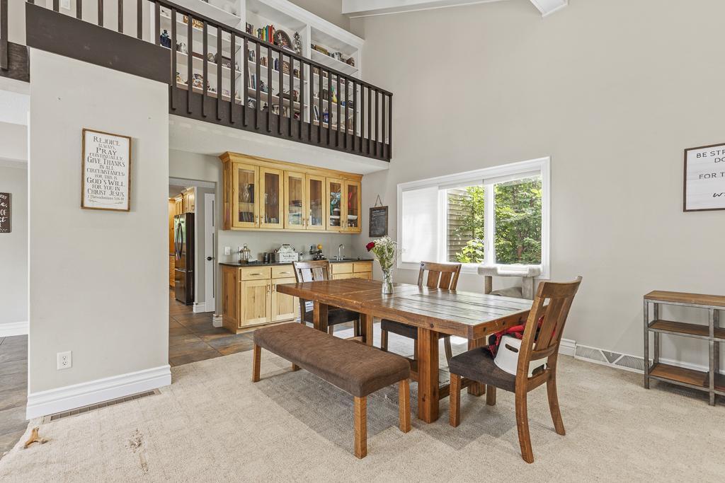 Curren dining room placement next to a wet bar! You'll absolutely love entertaining your family and friends here!