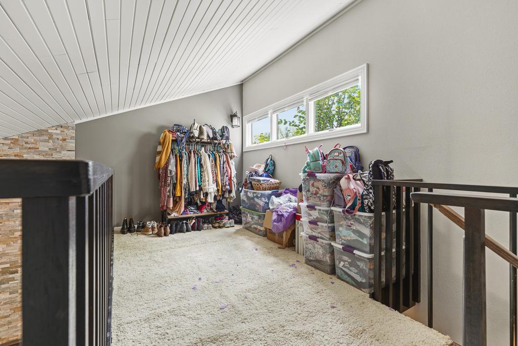 Finished loft space offers ample storage if you need more, or craft a cozy sitting space or reading nook