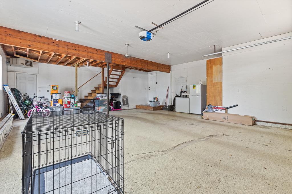 The garage also features a walk-up loft - amazing storage opportunity