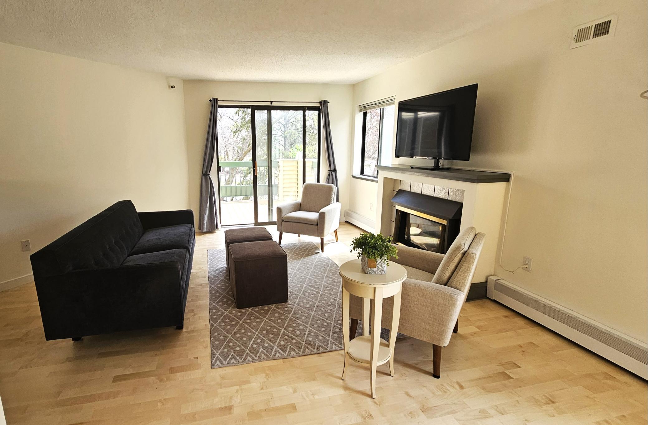 Spacious living room area with deck access.jpg