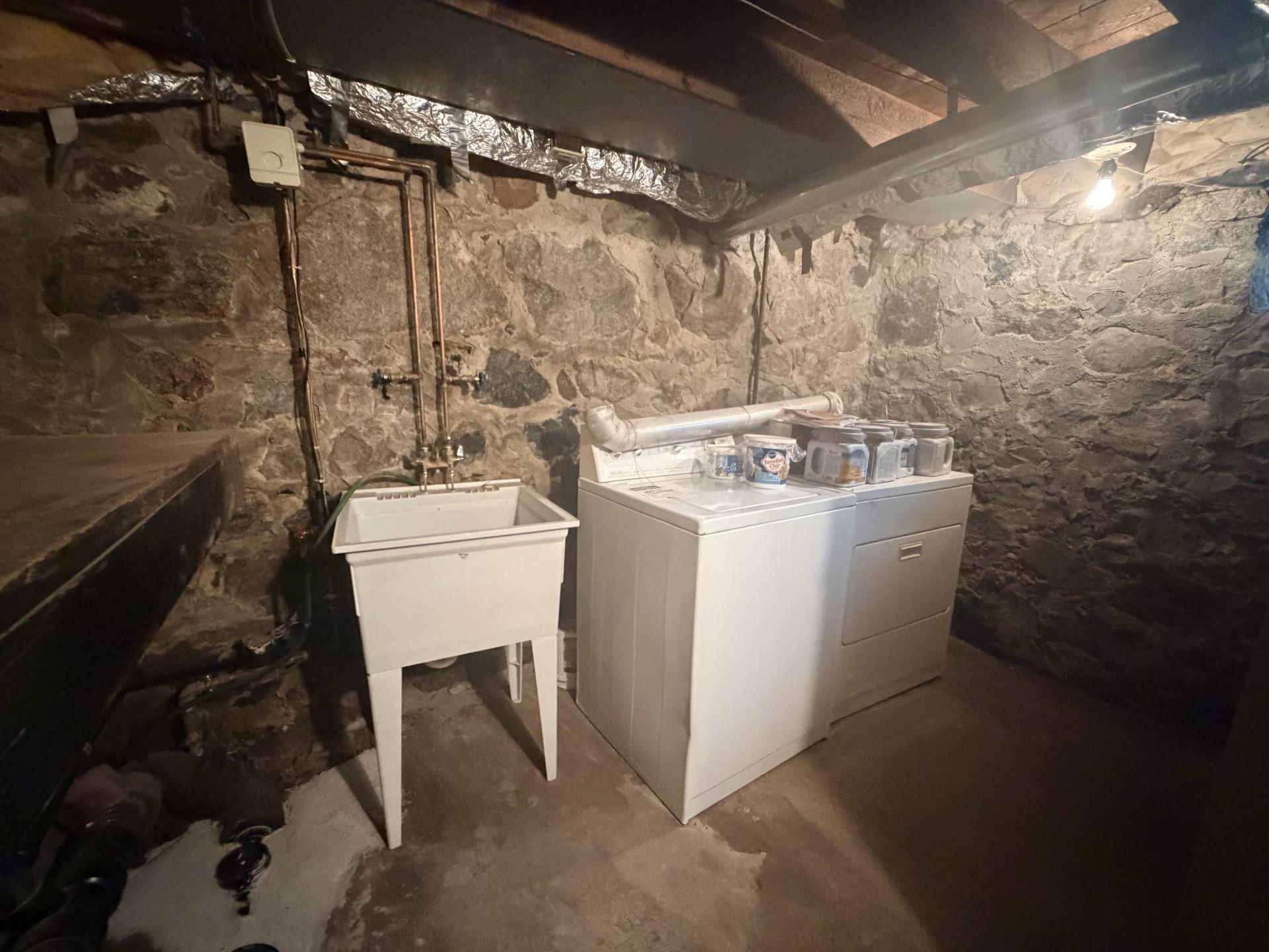 Lower level- washer/dryer and utility sink