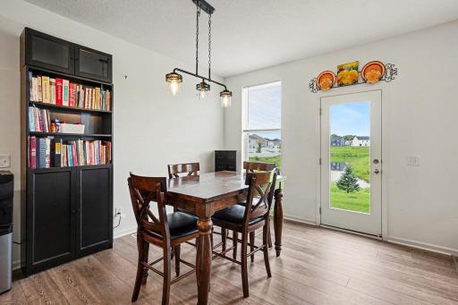 Informal Dining Open to Kitchen and Living, Eco-friendly door to back patio