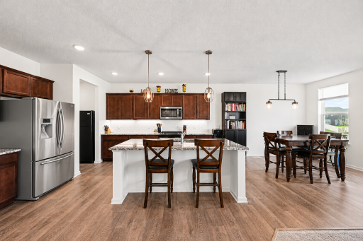 Open Concept Kitchen with Island breakfast bar - AI used to remove personal items only