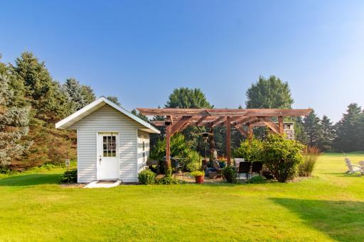 Garden shed off outdoor patio