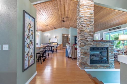 Double sided stone gas fireplace