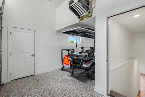 Dedicated golf cart garage with direct interior access to the lower levelâperfect for effortless access to the course and year-round convenience.
