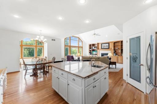 Open Floor Plan to Family Room with Large Center Island and Pantry