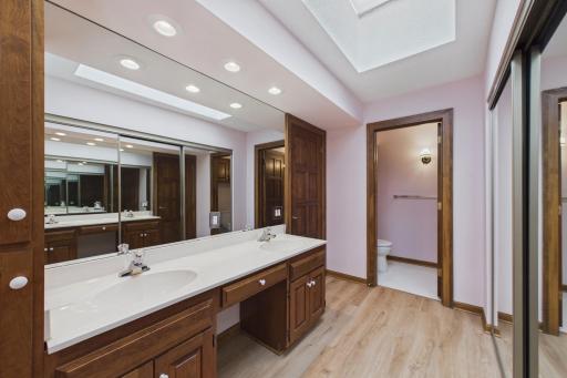 Another view of the primary bath and water closet, which is also where you will find the shower.