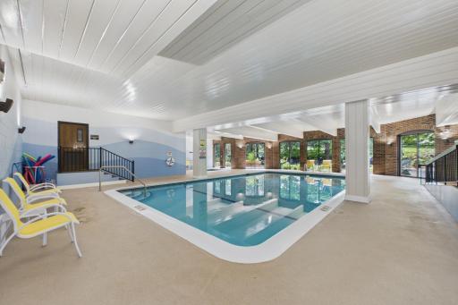 This association also features a pool and hot tub - with another patio outside the doors.