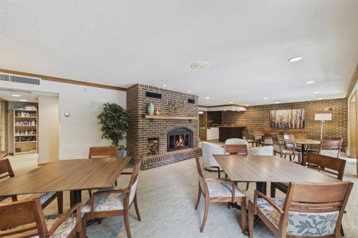 Fireside party room - for when you have more guests than your condo will hold! Notice the full kitchen and bar in the back corner and the library..
