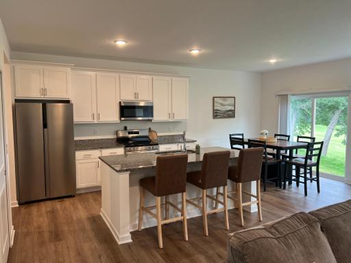 Kitchen with granite countertops and stainless steel appliances