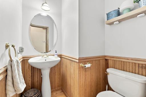 There is a convenient main level half bath
