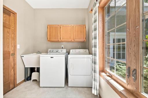Large laundry room with a window!! No doing laundry in the dark!