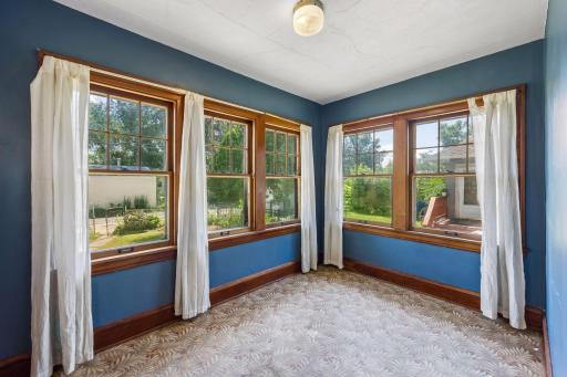 Sunroom perfect for a home office or enjoying a leisurely afternoon.