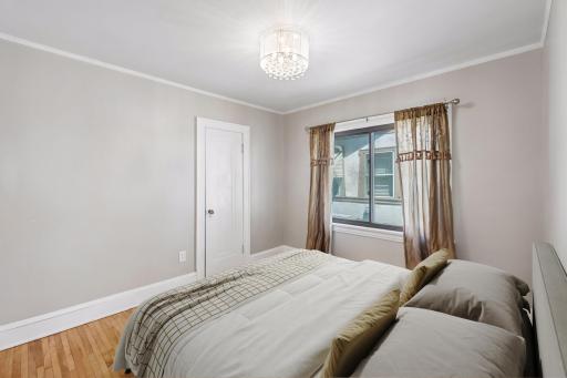 The main level features two spacious bedrooms (virtually staged).