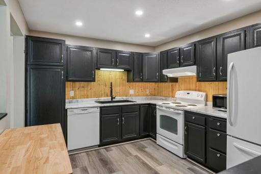 Dont like the dark contrast cabinets? Talk to us about having them painted prior to closing?
