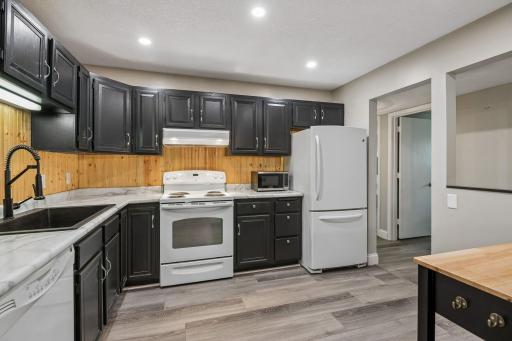 Dont like the dark contrast cabinets? Talk to us about having them painted prior to closing?