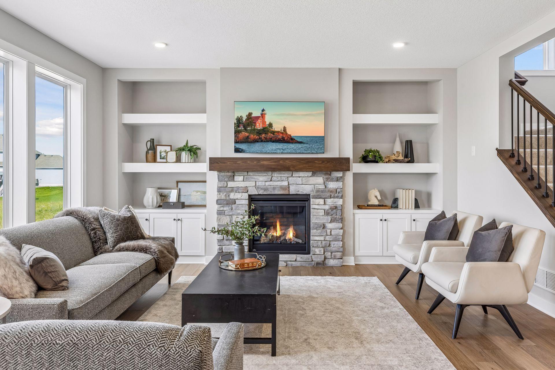 The living room on the main floor has a beautiful gas fireplace and wall built-ins.