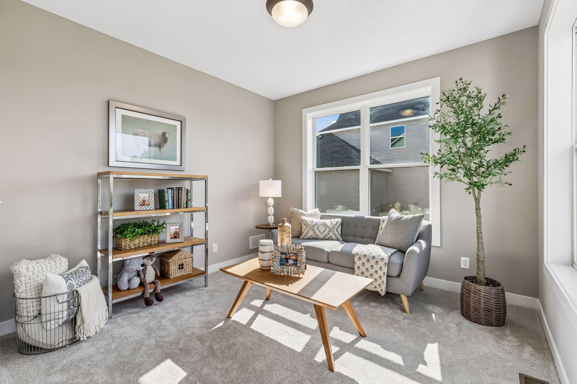 Just off the kitchen is the sun room. Use it as a reading nook or a place for your kids to play.